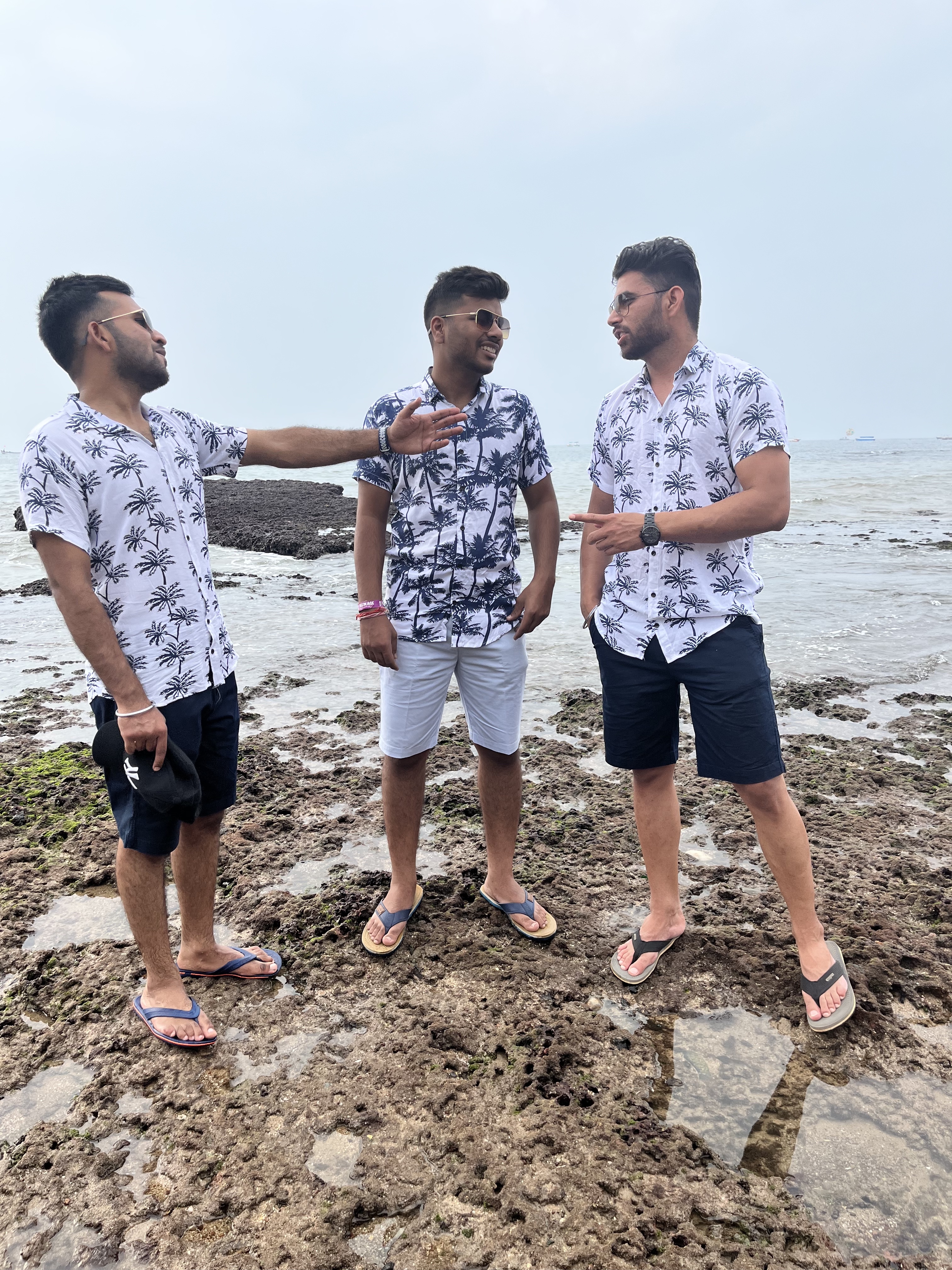 Sanyam Aggarwal, Ankit Goyal and Harpreet Singh, having a conversation at the Anjuna Beach Front