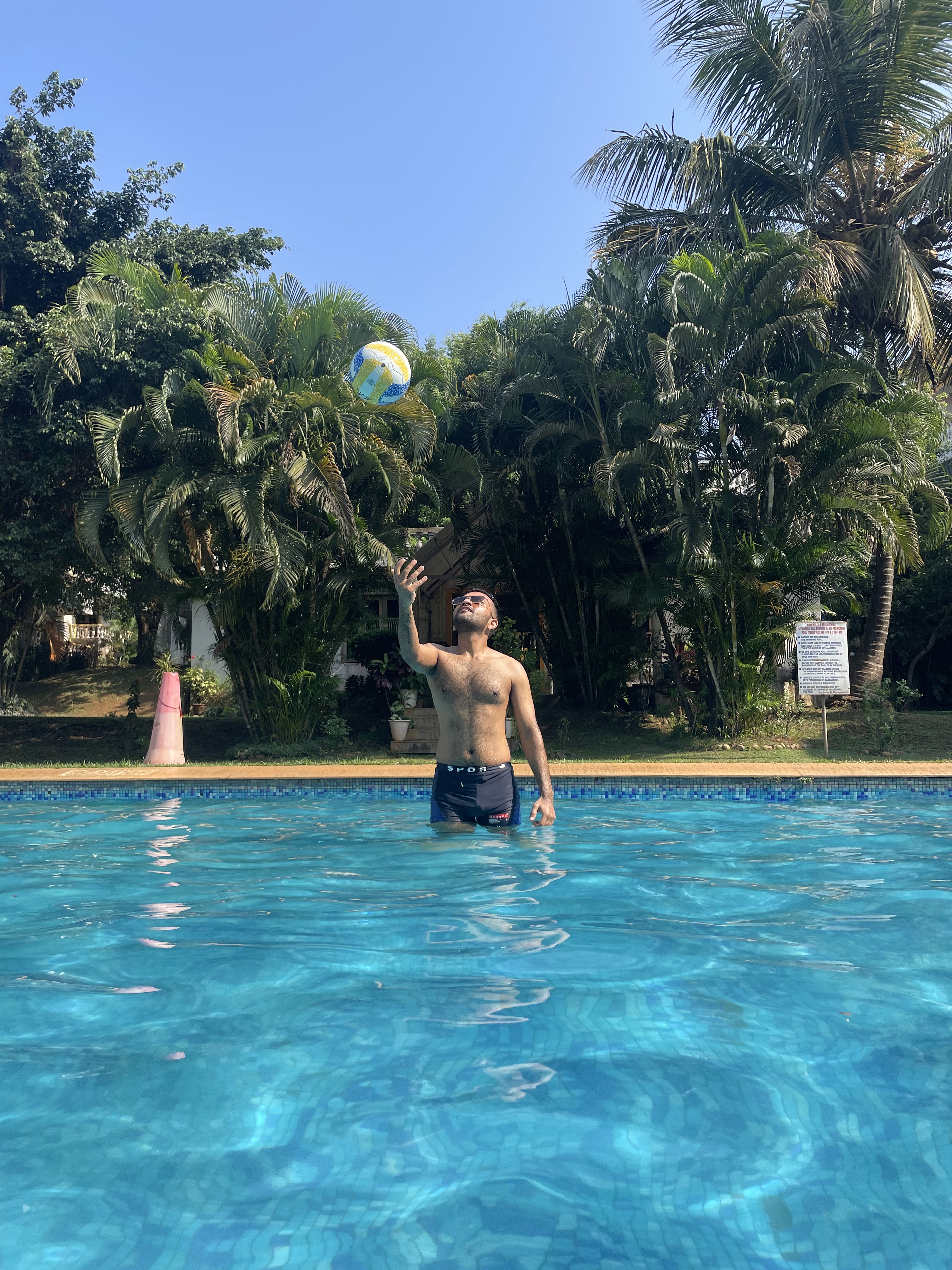 Sanyam Aggarwal tossing a volleyball